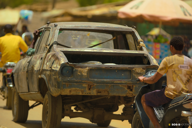 Hassane Chaibou Nari — Niamey, Niger. Despite the years and the makeshift repairs, this car keeps running and keeps connecting residents to their work and families.