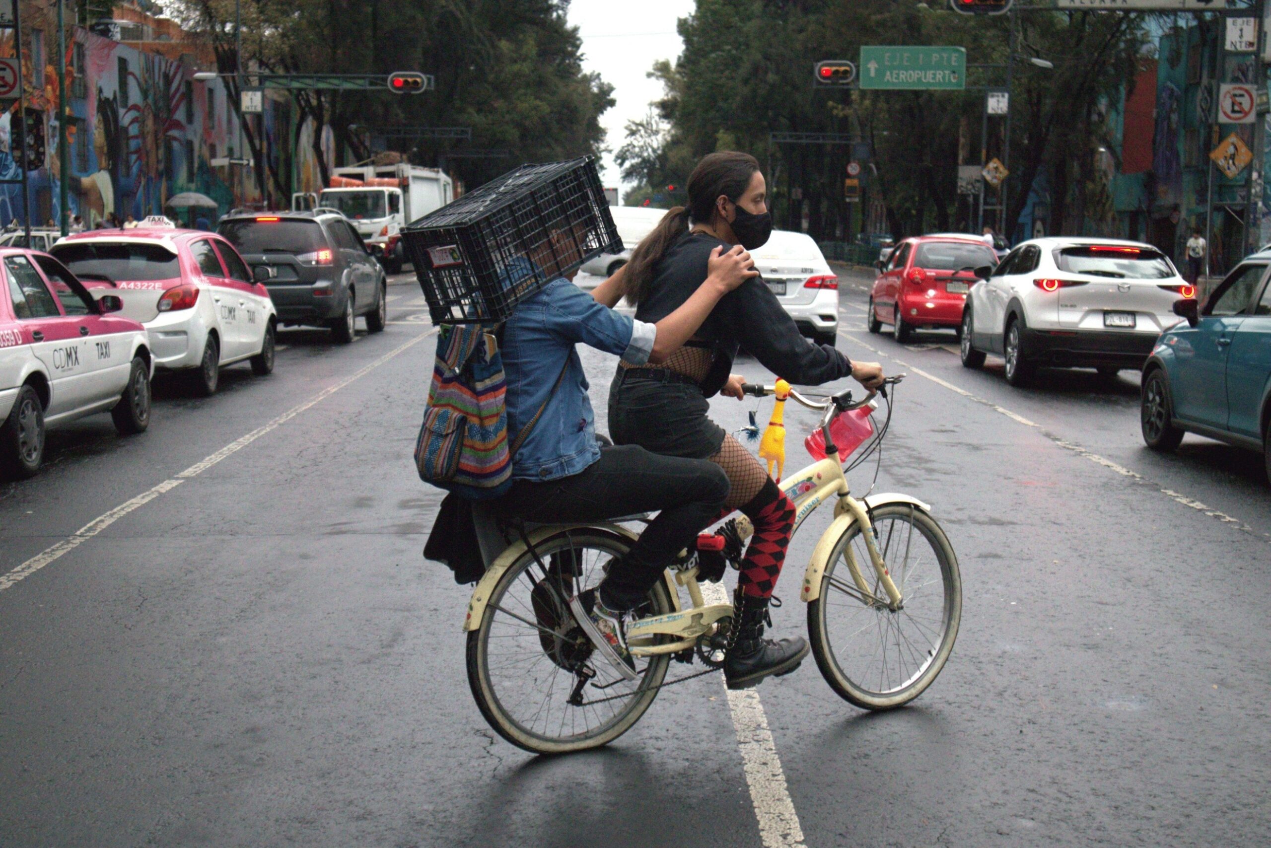 José Luna — Mexico City, Mexico. A man carries a taxi door on his bicycle in the Peralvillo neighbourhood.